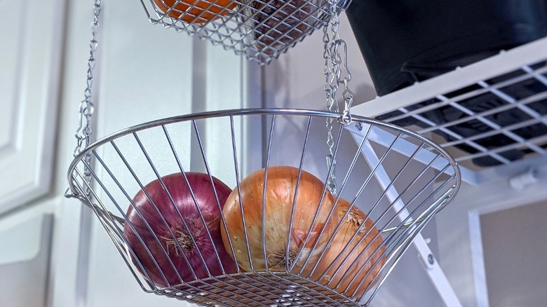 hanging wire basket with onions