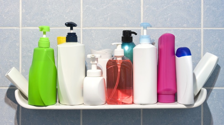 soap bottles on shower shelf