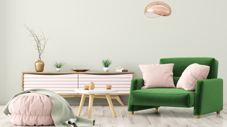 green chair with pink ottoman