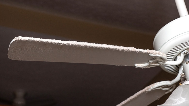 Ceiling fan coated in dust