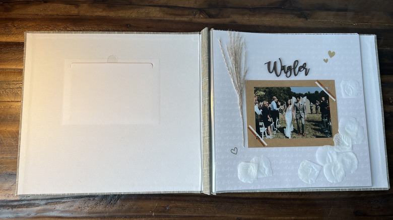 open scrapbook with designed page