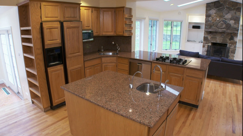 chestnut paneled kitchen