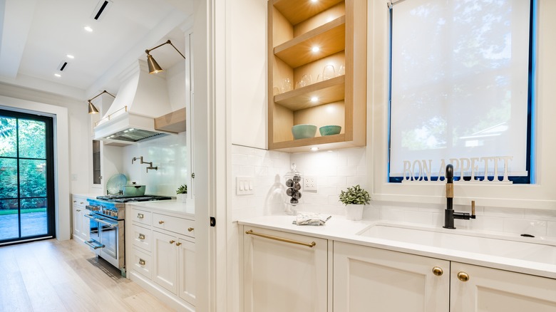 Open shelving and white cabinets