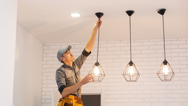 Man installing lighting 