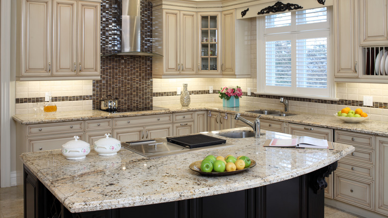 gray traditional kitchen with granite countertops