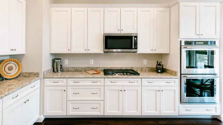 microwave over stove in a kitchen