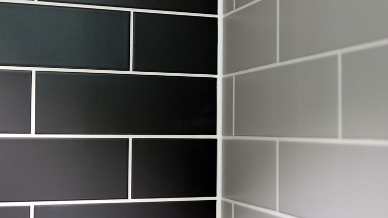 Dark tiles with contrasting white grout