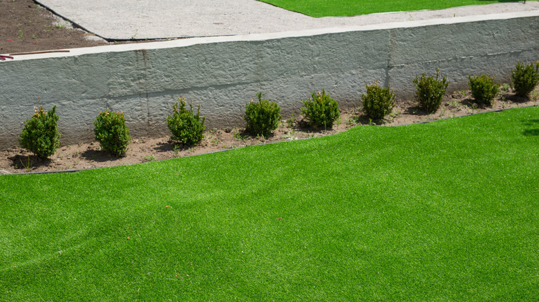 Artificial grass on uneven surface