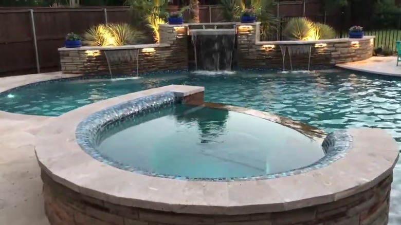 pool with stone waterfall 