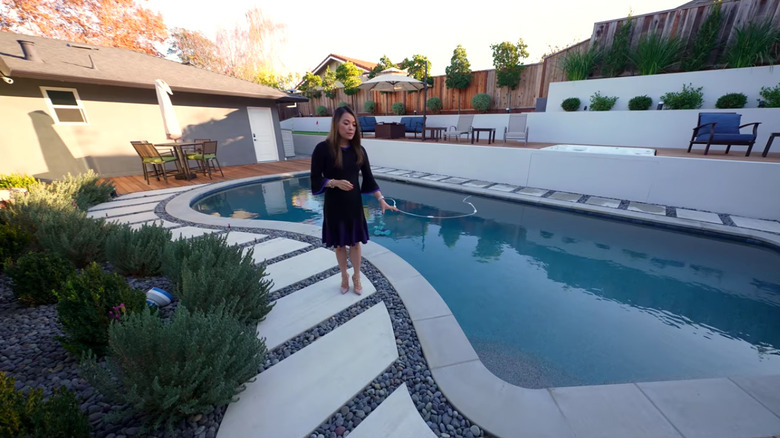 pool with terrace plants and seating