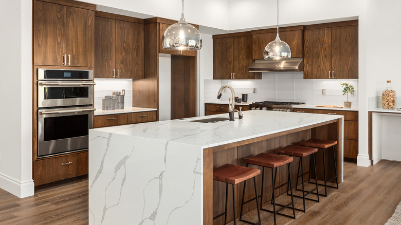 wooden kitchen with quartz counters