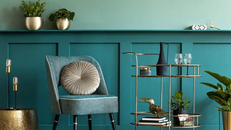 Room with bright teal wall