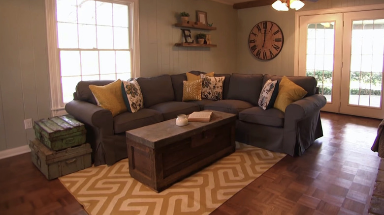 yellow accent pillows on sofa