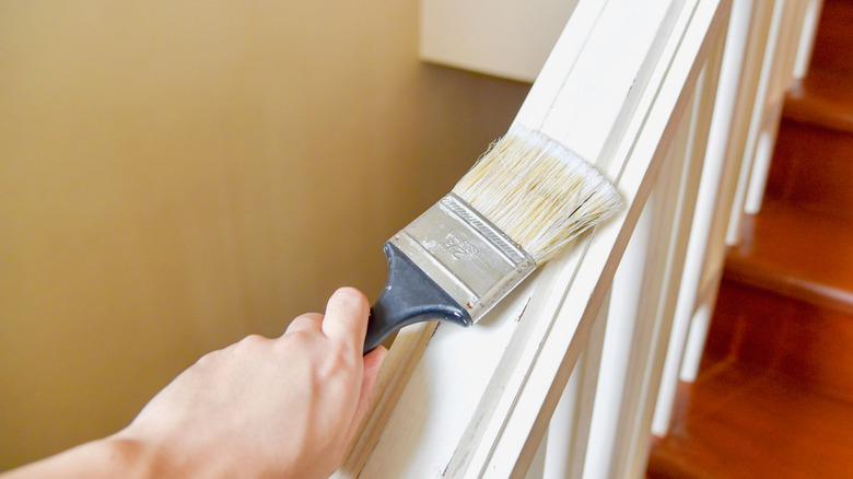 Painting a railing white