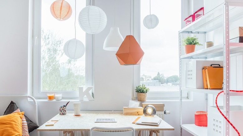 Pendant lantern lights over desk