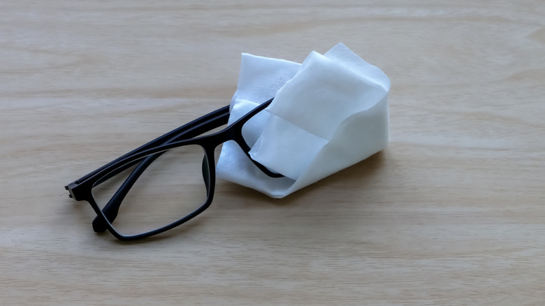Pair of eyeglasses with tissue