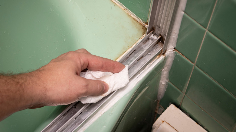 Cleaning shower door tracks