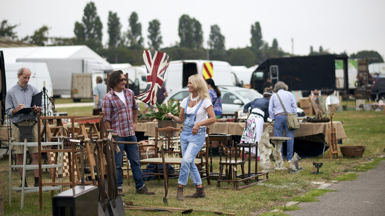 Paul O'Leary and Helen Parker shopping for furniture outside