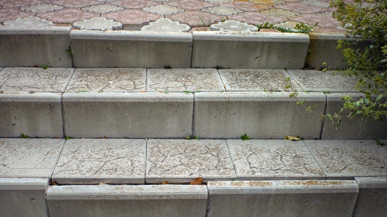 Concrete paver stair steps that are cracking and shifting apart