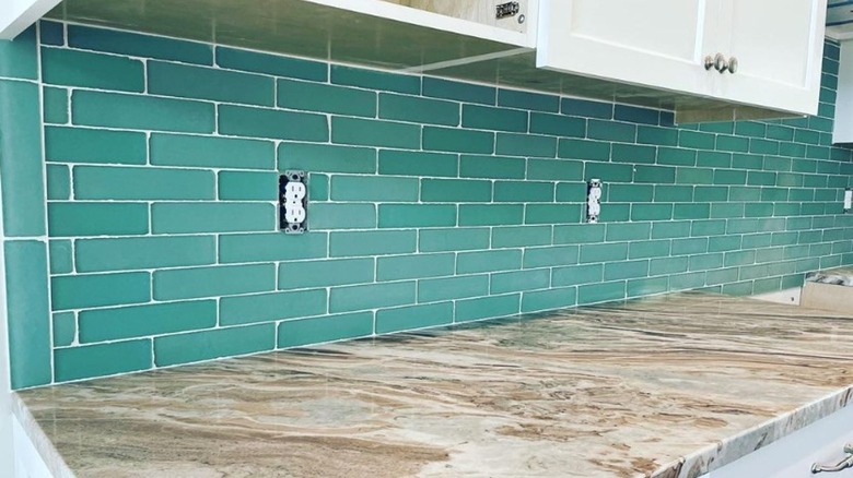 Sea glass backsplash in kitchen