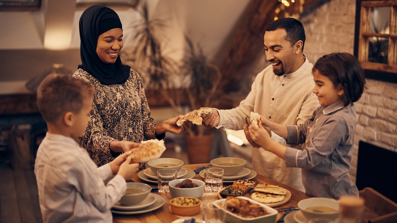 Family sharing meal together at home