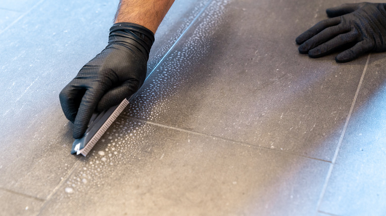 cleaning grout on tile floor