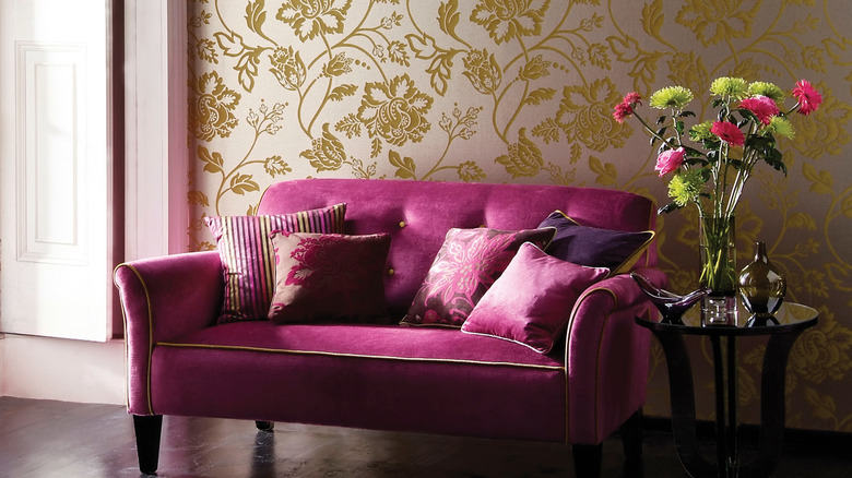 living room with textured, floral wallpaper