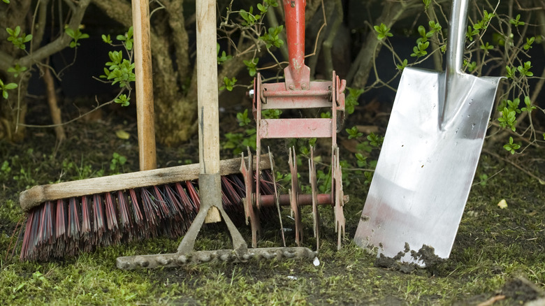 lawn tools including push broom