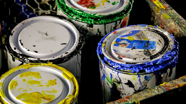 Paint cans with stuck lids