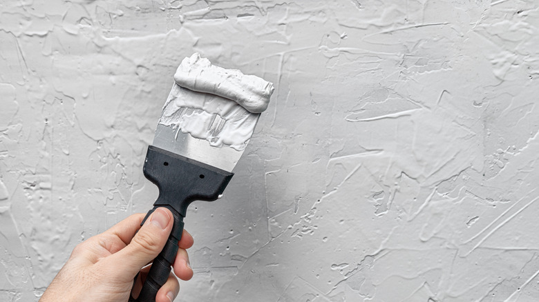 Hand applying wall texture