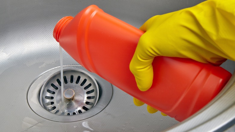 Pouring liquid down drain