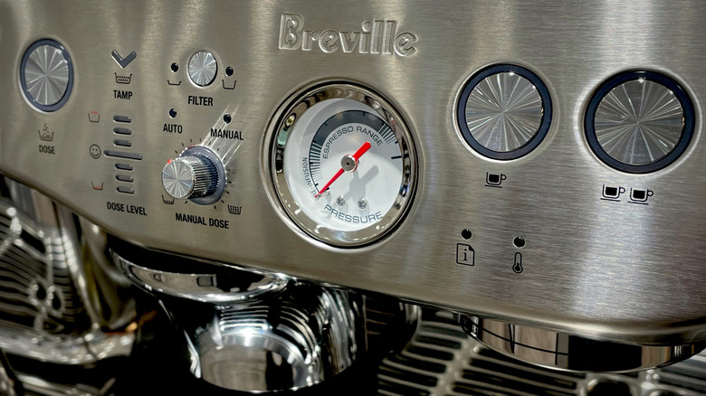 The top of a Breville coffee machine, showing the various buttons and options.