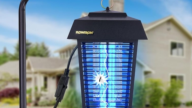 A hanging Flowtron bug zapper