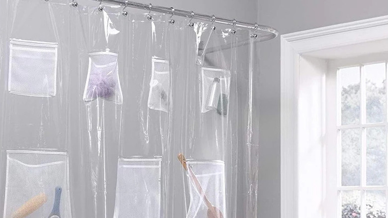 plastic shower curtain with mesh pockets and bath products