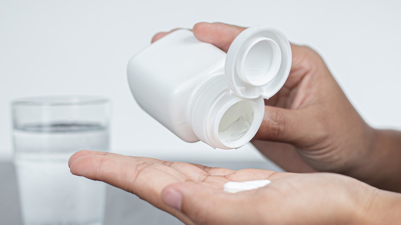 Taking aspirin out of the bottle