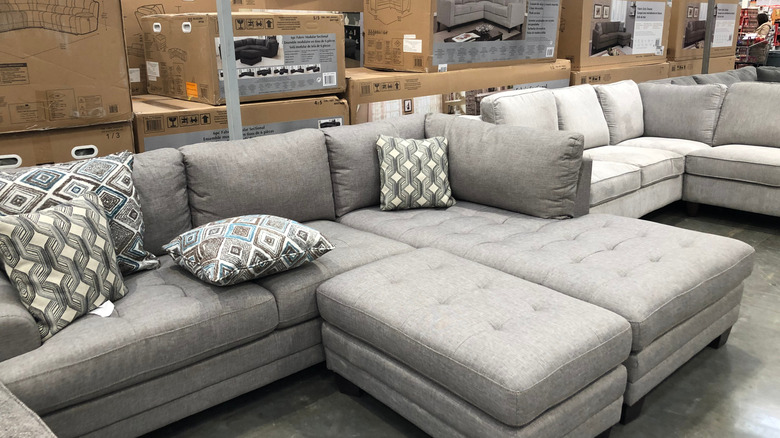 Sectional sofas on display in a Costco warehouse store