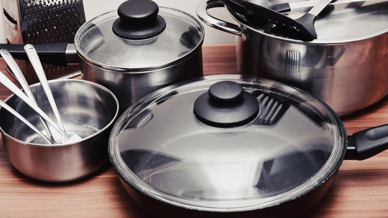 An array of pots and pans on a countertop