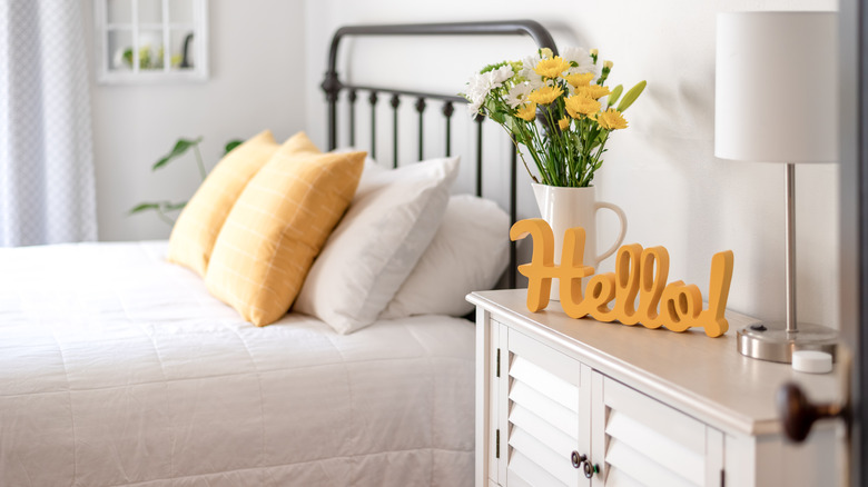 welcoming guest room hello sign