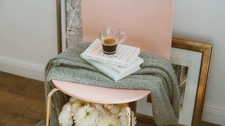 Simple pink chair with coffee