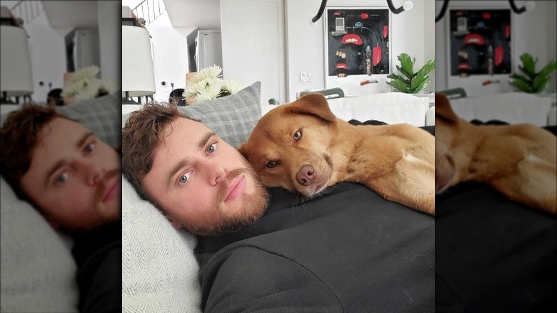 Gus Kenworthy and dog in house