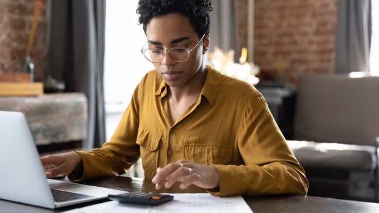 Woman calculating finances