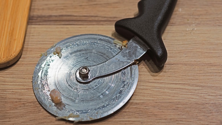 pizza cutter on counter