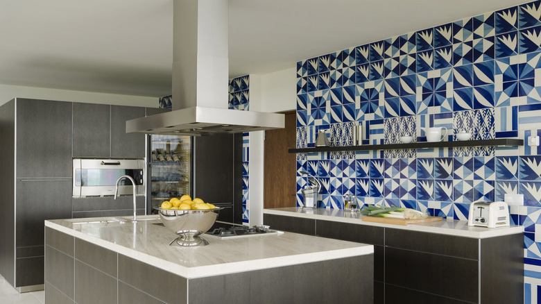 Blue and white tiles on kitchen wall