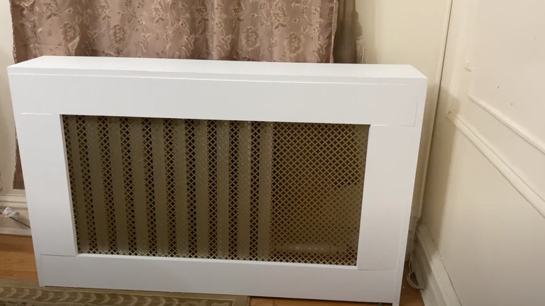 White and gold radiator cover