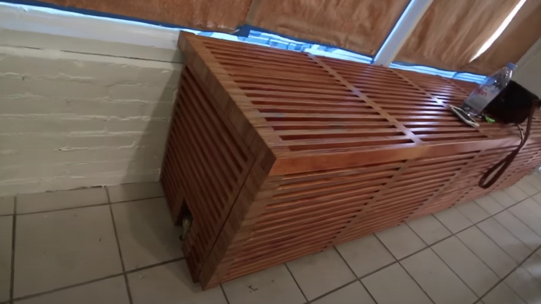 Wooden bench over radiator