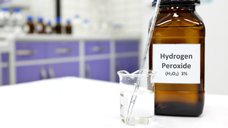 Hydrogen peroxide with beaker 