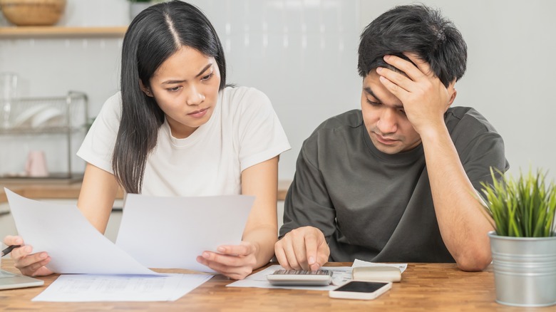 two people and laptop