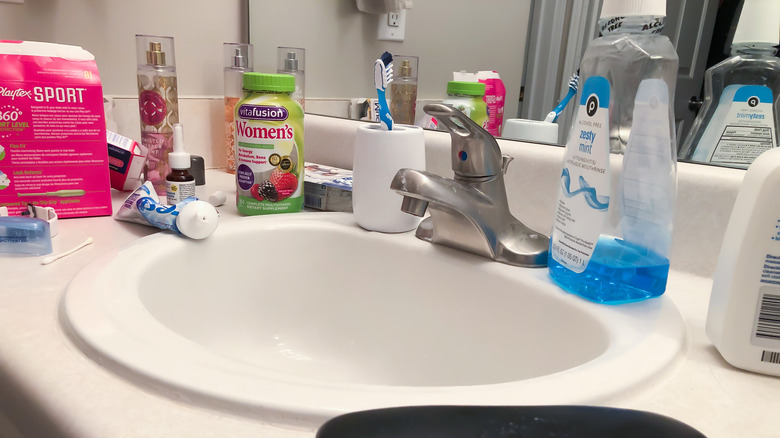 Cluttered bathroom counter