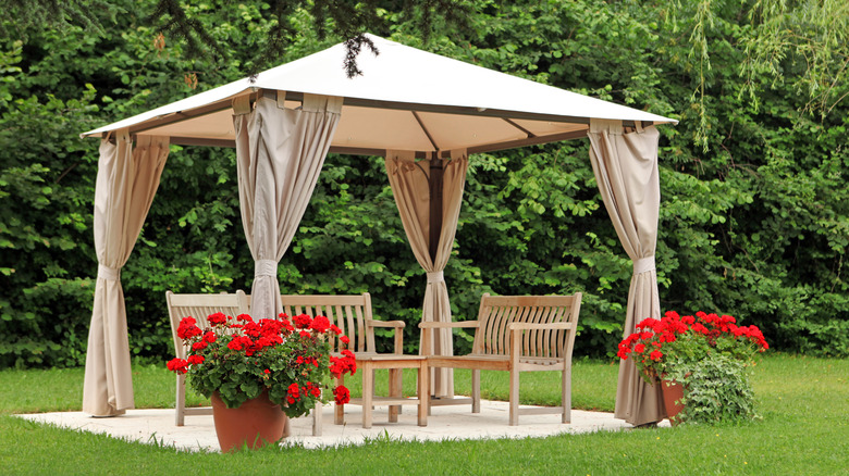 Covered pergola with benches