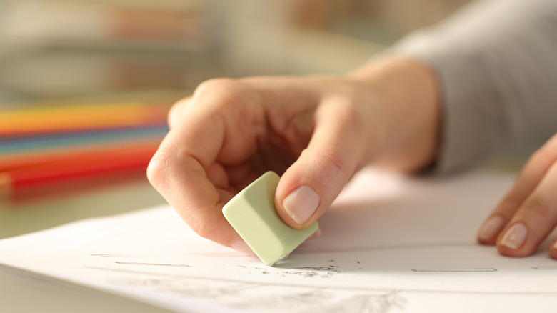 woman using eraser